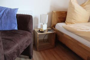 Ein Bett oder Betten in einem Zimmer der Unterkunft Gästehaus Glaubenstein
