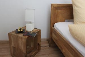 Ein Bett oder Betten in einem Zimmer der Unterkunft Gästehaus Glaubenstein