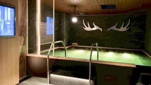 a pool of water in a room with at HOTEL LiVEMAX SAPPORO NAKAJIMA PARK GRANDE in Sapporo +42 photos