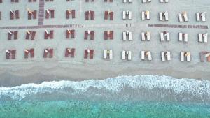 an overhead view of the beach with the ocean at Konstantinos Palace in Karpathos