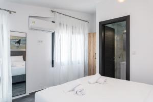 Voodi või voodid majutusasutuse Olympiada Residential Complex & Villas toas