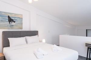 Voodi või voodid majutusasutuse Olympiada Residential Complex & Villas toas