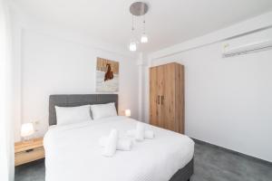 Voodi või voodid majutusasutuse Olympiada Residential Complex & Villas toas