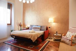 Postel nebo postele na pokoji v ubytování Honey Rooms Verona - camera Millefiori