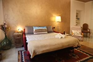 Postel nebo postele na pokoji v ubytování Honey Rooms Verona - camera Millefiori