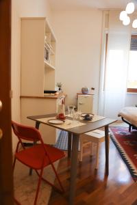 Kuchyň nebo kuchyňský kout v ubytování Honey Rooms Verona - camera Millefiori