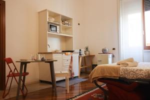 Posezení v ubytování Honey Rooms Verona - camera Millefiori + 18 fotografií