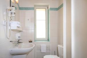 Koupelna v ubytování Horský hotel Remata