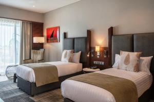 Кровать или кровати в номере Hotel Verde Zanzibar - Azam Luxury Resort and Spa - Dry Hotel