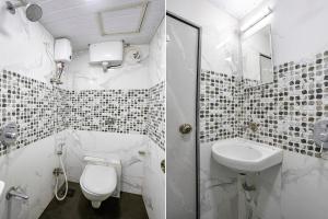 Koupelna v ubytování FabHotel Hans Residency
