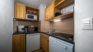 Kuchyň nebo kuchyňský kout v ubytování Central Park N 414 - 2P4