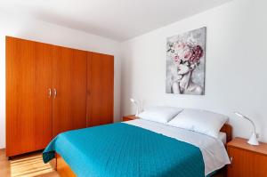 Postel nebo postele na pokoji v ubytování Villa Nona Andrejka - Elegance and Comfort + 26 fotografií