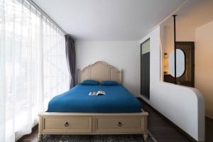 Postel nebo postele na pokoji v ubytování Zeus Living - Harmony Hideout