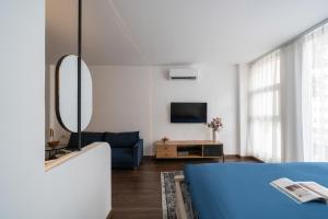 TV a/nebo společenská místnost v ubytování Zeus Living - Harmony Hideout