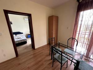 Postel nebo postele na pokoji v ubytování Guesthouse Apartments