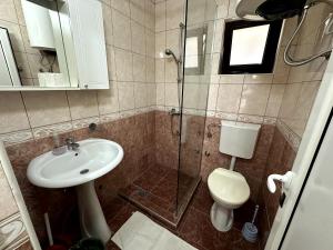 Koupelna v ubytování Guesthouse Apartments