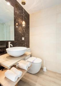 Koupelna v ubytování Hostal Plaza Boutique - Solo adultos + 15 fotografií