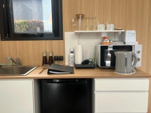 Eldhús eða eldhúskrókur á Kirisawabase Tiny House by Tiny Away