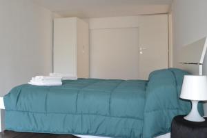 Postel nebo postele na pokoji v ubytování ENDLESS SUMMER APARTMENTS