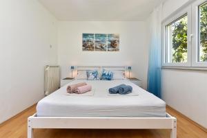 Posteľ alebo postele v izbe v ubytovaní Apartments Vlasta 1410