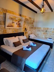 Postel nebo postele na pokoji v ubytování Castle Hotel