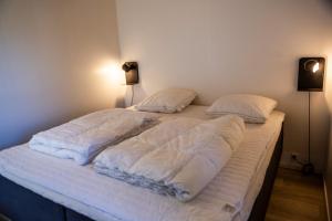 Postel nebo postele na pokoji v ubytování DCU-Camping Hornbæk
