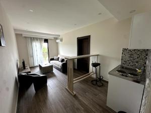 TV a/nebo společenská místnost v ubytování Guesthouse Apartments