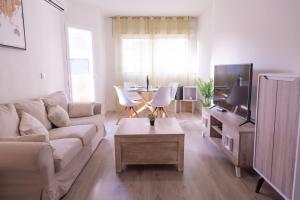 Et tv og/eller underholdning på Avenida Principal muy cerca de la playa - By Aloha Palma