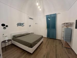 Giường trong phòng chung tại Casa indipendente