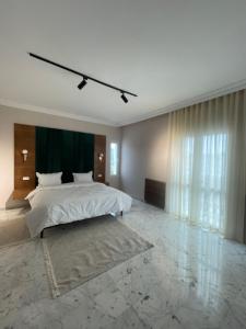 Postel nebo postele na pokoji v ubytování Appart hotel lac 2 Tunis