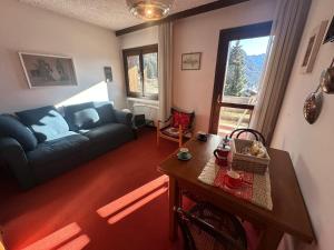 Posezení v ubytování Comfort in the heart of Campligio