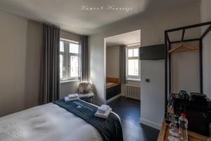 Postel nebo postele na pokoji v ubytování Hotel Bonne Auberge (Adults Only)