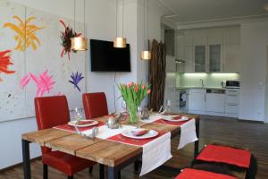 TV a/nebo společenská místnost v ubytování Ferienwohnung Belle Etage - Luxuriös, exklusiv und traumhaft schön mit Aufzug