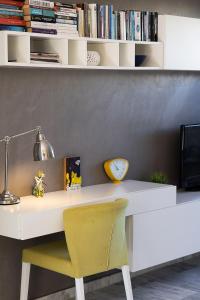 TV a/nebo společenská místnost v ubytování Pigi Paradise Residence