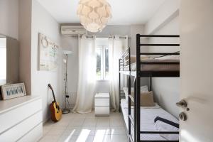 Postel nebo postele na pokoji v ubytování Pigi Paradise Residence