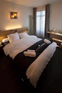 Postel nebo postele na pokoji v ubytování Hotel Bonne Auberge (Adults Only)
