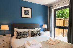 Ένα ή περισσότερα κρεβάτια σε δωμάτιο στο Your Space Apartments - Eden House