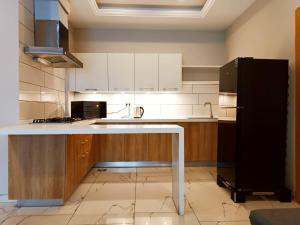 Køkken eller tekøkken på Serene Oasis