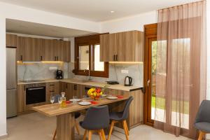 Η κουζίνα ή μικρή κουζίνα στο Olivia