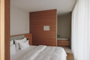 Postel nebo postele na pokoji v ubytování Hotel Schwarzschmied