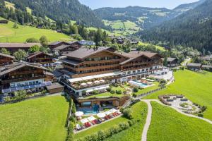 an aerial view of a resort in the mountains at Alpbacherhof Mountain & Spa Resort in Alpbach