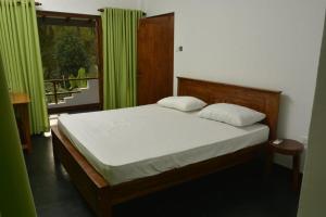 Katil atau katil-katil dalam bilik di Riverside Farm Stay
