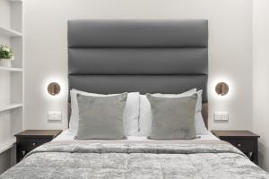 Cleveland Residences Russell Square客房内的一张或多张床位