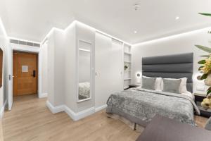 Cleveland Residences Russell Square客房内的一张或多张床位
