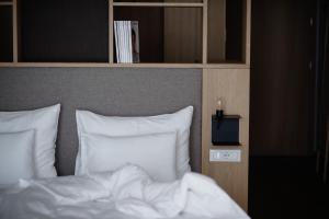 Postel nebo postele na pokoji v ubytování Hotel Schwarzschmied