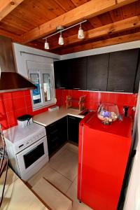 A kitchen or kitchenette at Kalamata Suites