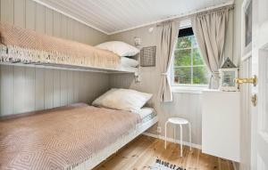 Katil atau katil-katil dalam bilik di 4 Bedroom Beautiful Home In Lødingen