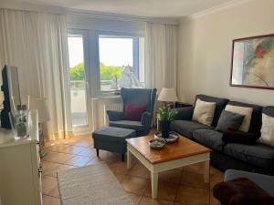 Posezení v ubytování Haus Ankerlicht Wohnung 61 + 3 fotografie
