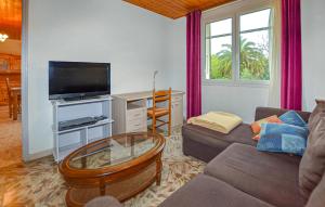 TV a/nebo společenská místnost v ubytování Villa Piscine Privée