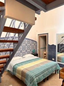 Postel nebo postele na pokoji v ubytování Hotel 4 Stagioni